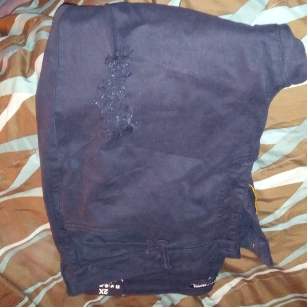Torn fashion jeans